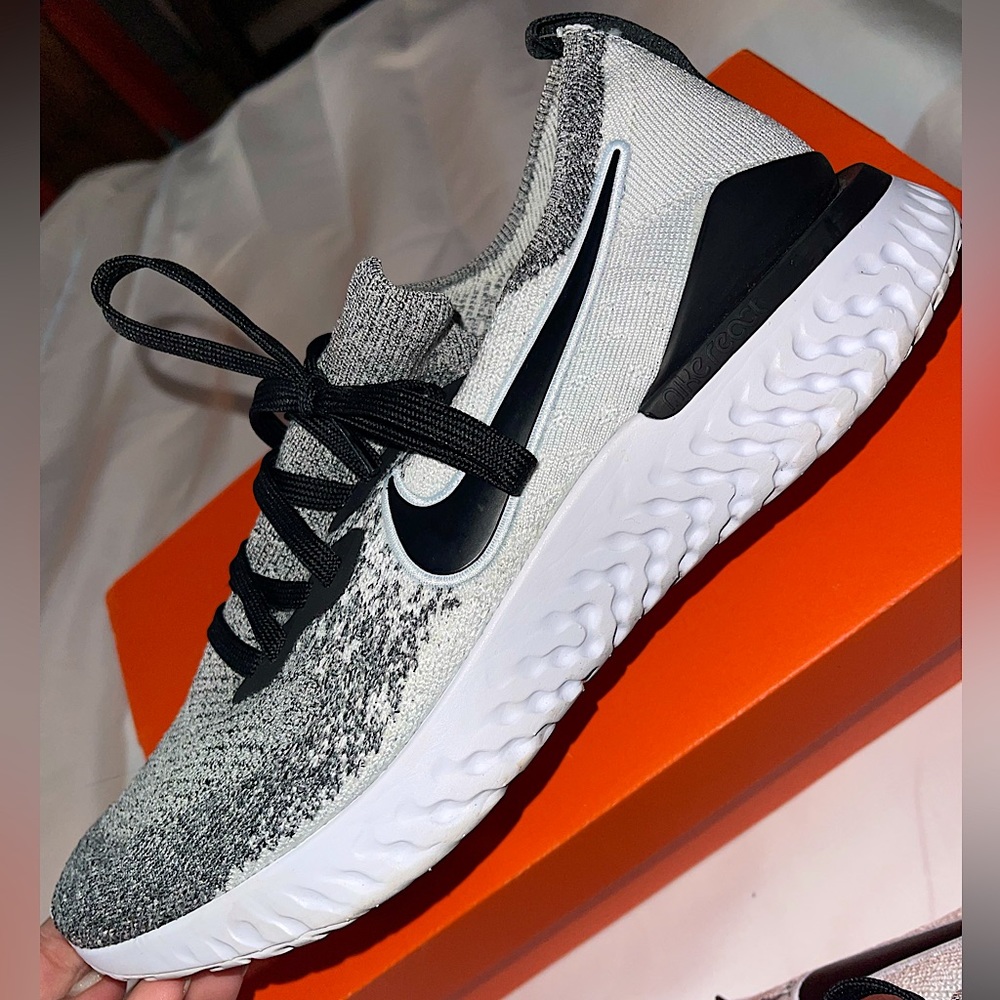 Black/White/Gray Nike Free Run running sneakers